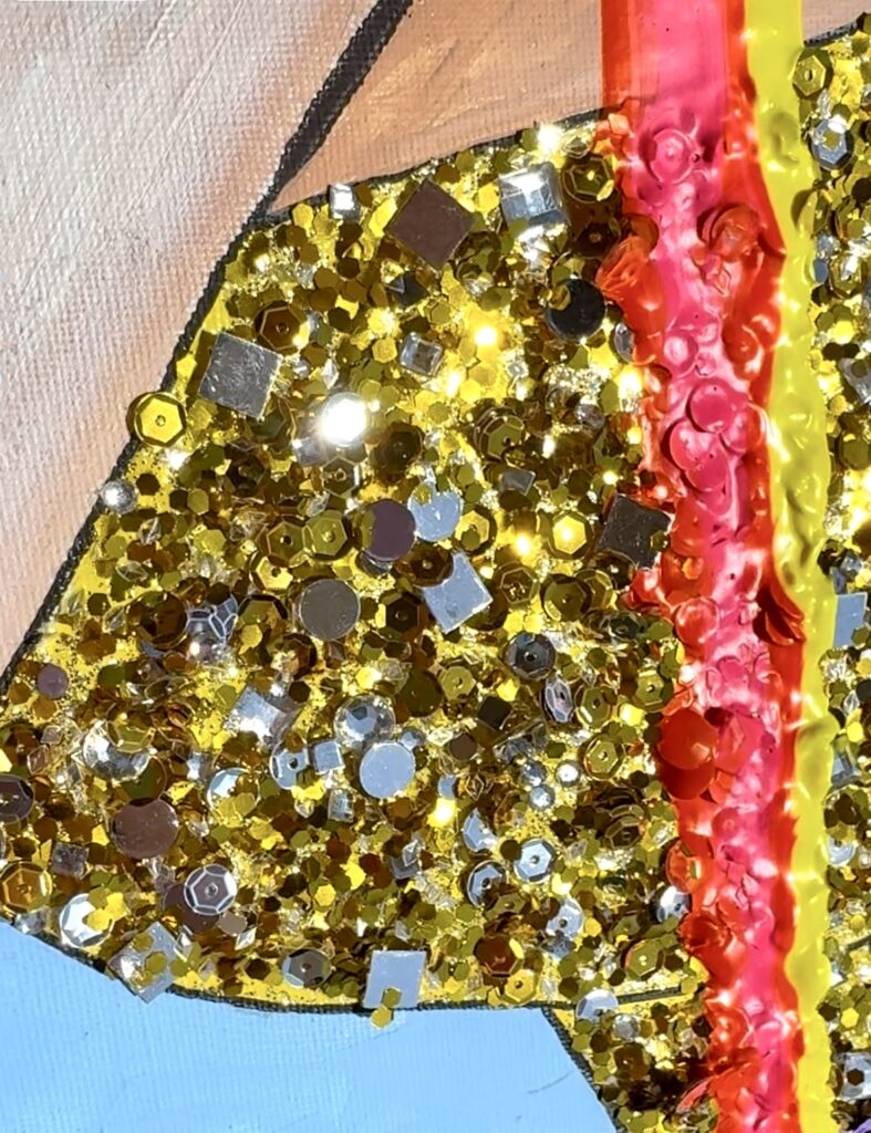 Close-up of an artistic piece featuring shimmering gold and silver sequins, along with vibrant red and yellow paint, arranged in a playful, textured design against a light blue background.